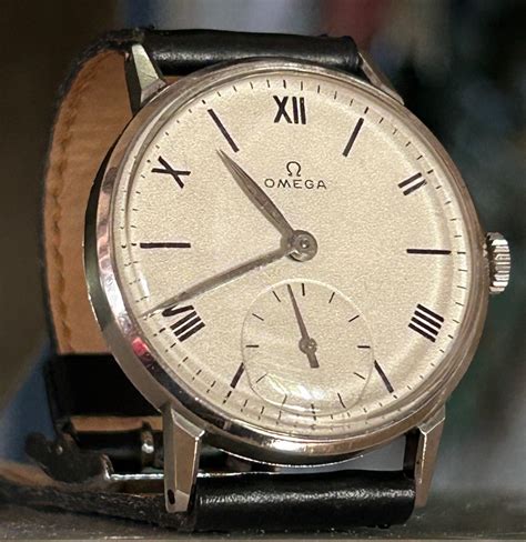 how do you open a watch mechanical omega